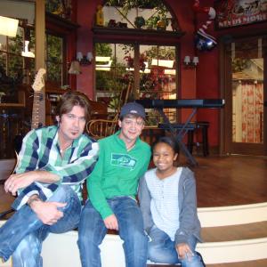 Kiara and Billy Ray Cyrus and Jason Earles on the set of Hannah Montana