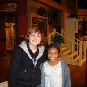Kiara on the set of Hannah Montana with Angus T Jones from Two and a Half Men