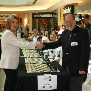 Susan Polgar breaking the World Record: Most Simultaneous Games Played 326 players: 309 wins, 14 draws and 3 losses = 96.93% in 16 hours and 30 minutes