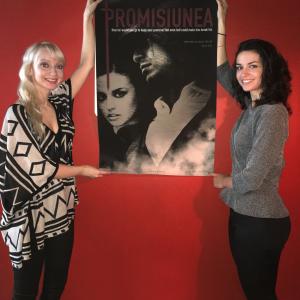 Natalya Lazareva Creative DirectorProducer and Cristina Lippolis Lead ActressProducer hold the movie poster up for the film Promisiunea