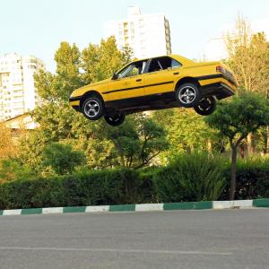 long car jump in street of Iran tehran