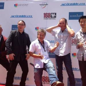 Joseph Steven Ken Jacobsen Henry Wong producer of The Monkey King James Runcorn of 58 and Robert Wu goofing around on the red carpet at the premieres for the 168 Project Film Festival Klus stars in The Grievance Clause
