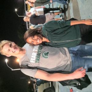 On set of  When the Game Stands Tall Alexander Ludwig and Starlette Miariaunii