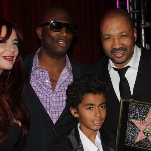 Alex Al receives Lifetime Achievement award as musician at Hollywood Fame Awards with a big congratulation from vocalist T.J Gibson and the James Brown family.