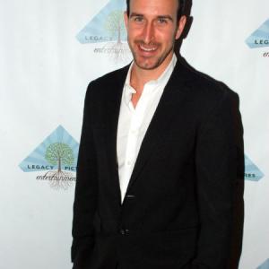 Adam Ward at the premiere of Three Guys  a Couch