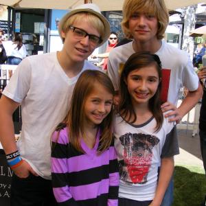 Sophia Strauss with Victoria Strauss, Devin Fox and Lou Wegner at the Marley and Me event
