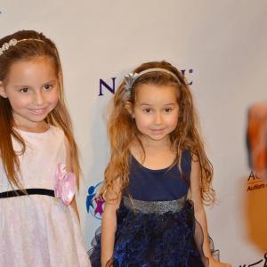 Shea and her sister Sofie Taylor on the red carpet during ACT Todays Denim and Diamonds Charity Event