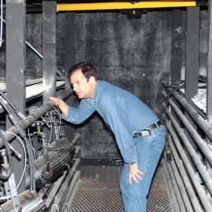 Doug La Rue inspects stage lighting equipment - 2005