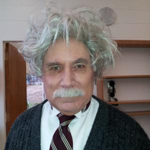 Brian St August as Einstein in a national commercial for Coupon Bug