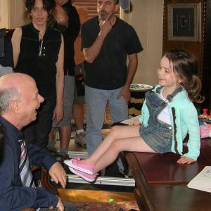 olivia & wallace shawn between takes on set of 