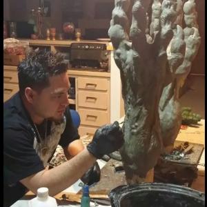 Daniel DC Casillas sculpting 3 foot creature arms