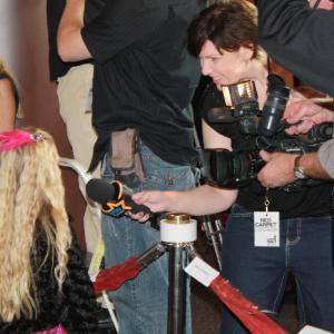 Emily interviewed by reporters at the Red Carpet event for the film Sodales directed by Jessica Biel Oct 2010