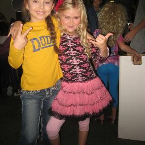 Nov 2010 Emily on Disney Shake It Up! set with costar Caitlin Carmichael