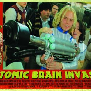 ...in the role of Blondie (Supp.) in Scorpio Film Releasing's ATOMIC BRAIN INVASION.