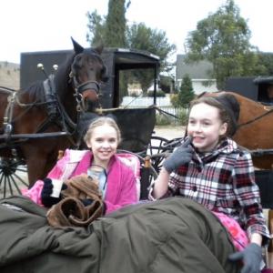 Chloe Madisonand Darcy Rose Byrneson set of 'Amish Grace'