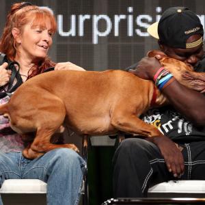 Founder of Villalobos Rescue Center Tia Torres and Earl Moffett speak onstage at the Pit Bulls  Parolees panel during the Discovery Communications portion of the 2014 Summer Television Critics Association at The Beverly Hilton Hotel on July 9 2014 in Beverly Hills California