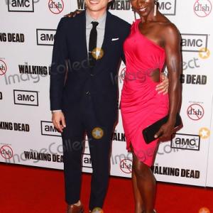 Steven Yuen and Jeryl Prescott arrive for the season 3 premiere of The Walking Dead at Universal City Walk in Los Angeles, October 4, 2012