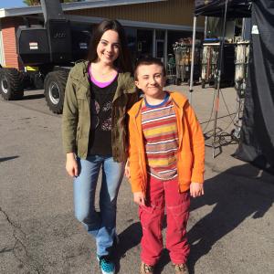 Ava Allan and Atticus Shaffer on the set of 