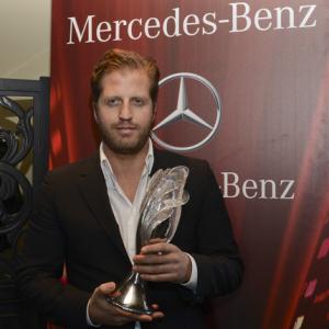 Producer Jonathan Venguer receiving award at the 25th Palm Springs International Film Festival for MEDEAS