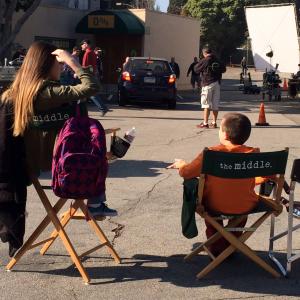 Ava Allan  Atticus Shaffer in between takes on the set of The Middle 2014