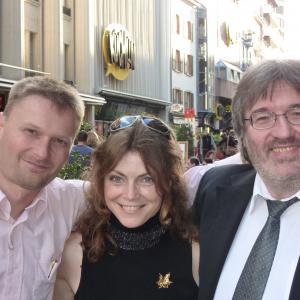 Eric Oberli Jolanda Ellenberger and Tom Hanke celebrate in the streets of Basel after their European Film Premire