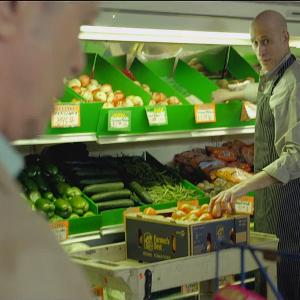 Max Bogner as Phil, The Green Grocer, with David Bowie (in foreground) in his recent music video: 