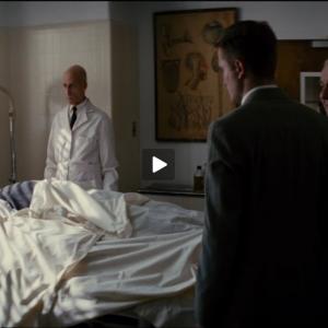 With Robert Pattinson as Coroner in 