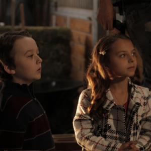 BENJAMIN STOCKHAM and CAITLIN CARMICHAEL on the set of A COUNTRY CHRISMTAS