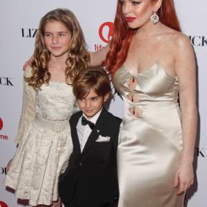 Taylor Ann Thompson, Trevor Thompson, and Lindsay Lohan at Lifetime 