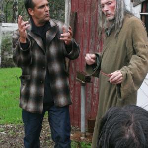 Behind the scenes from the movie Black Asylum,directed by Robert Rusler. Robert Rusler goes over a scene with Billy Drago.