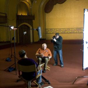 BTS Photo of Josh interviewing Marcel Blaakman, WWII Survivor & Veteran. Andrew Manzano, DP, gathering B-roll.
