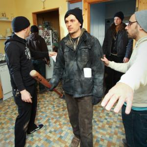 Cowriters and codirectors Adam Bartlett and John Pata walk through a scene with actors on the set of Dead Weight second day of filming