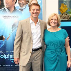 Michael Roark and his mother attend the Premiere of Dolphin Tale at The Village Theatre on September 17 2011 in Westwood California