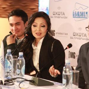 Marina Kunarova in the middle on pressconference of her films release of Hunting the Phantom in Kazakhstan