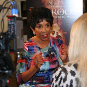 War Room Actress Karen Abercrombie speaks with reporters on the red carpet.