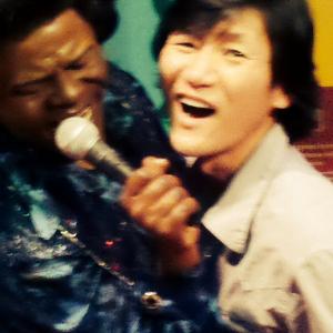 Bradlee singing with the great James Brown at The Wax Museum