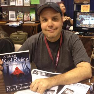 Signing copies of his novel A Tale of Red Riding, Rise of the Werewolf Huntress at WonderCon 2013! #neoedmund