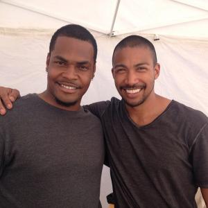 with Charles Michael Davis while filming CW's 