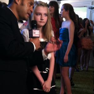 Ashly Switzer being interviewed at Young Artist Awards (2012)
