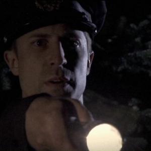 Michael Kram portraying a Mobile, Alabama police officer in the 