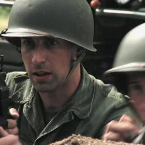 Michael Kram portraying an American soldier in the 