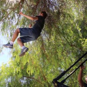 Carsen Warner jumping off the jump swing - Stunt Kids