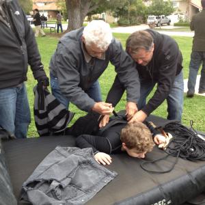Carsen Warner getting strapped up for his stunt on the set of the Hyundai Super Bowl Commercial 