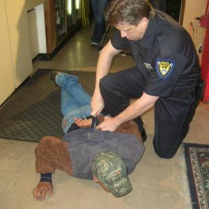 In character making arrest in the film The American Dream