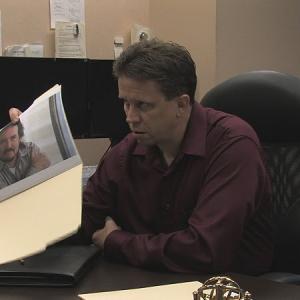 Office scene in Crossing the Enemy The Identity Crisis