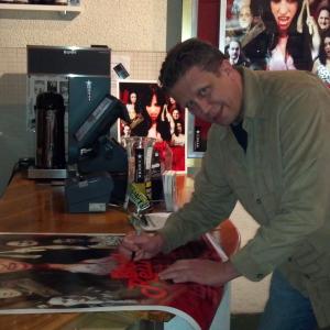 Signing the Blood Reunion poster for which I was Stunt Coordinator