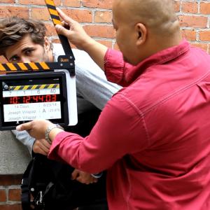Costin Becheanu prepares to shoot his scene while director Joseph Villapaz works the slate.