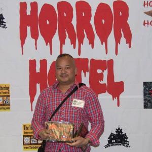 Director Joseph Villapaz receives a 4th Place award for Best SciFi Short for his film 14 DAYS at the International Horror Hotel film festival