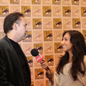 Amber Valdez covers 2011 Comic Convention San Diego CA pictured here with Nicholas Cage for AMC Theatres