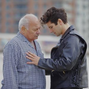 Still of Burt Young and Jacques Mitchell, in Tom in America